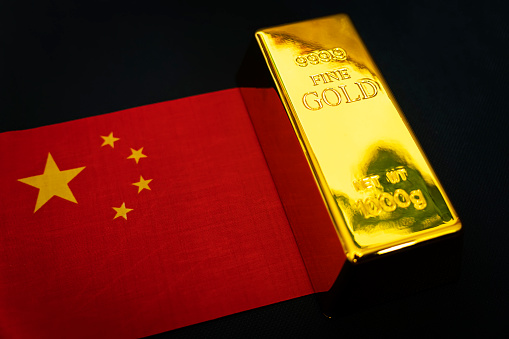 gold bar is on the national flag of China. chinese Gold Reserve concept