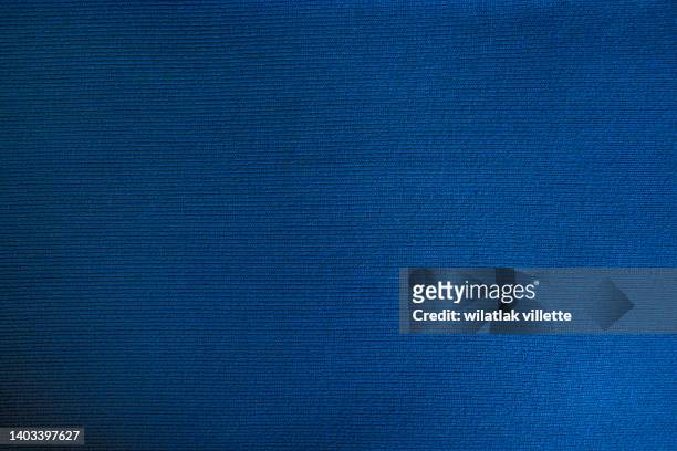 dark blue fabric cloth polyester texture and textile background. - marineblauw stock-fotos und bilder