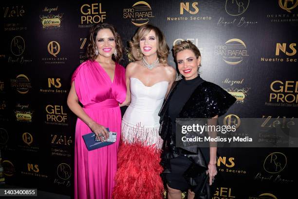 Lili Brillanti, Raquel Bigorra and Carmen Muñoz pose for a photo poses for a photo during a celebration of Raquel Bigorra 48th Birthday on June 16,...