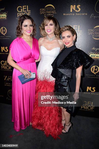 Lili Brillanti, Raquel Bigorra and Carmen Muñoz pose for a photo poses for a photo during a celebration of Raquel Bigorra 48th Birthday on June 16,...