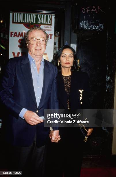 British actor Michael Caine and his wife, Guyanese actress and fashion model Shakira Caine, arriving for Michael's 60th birthday party, held at the...