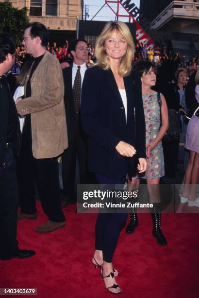 American fashion model Cheryl Tiegs attends the Hollywood premiere of 'The Cable Guy,' held at Mann's Chinese Theater in Los Angeles, California,...