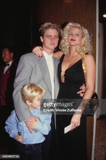 Daniel Ross with his sister, American glamour model and actress Anna Nicole Smith , and her son, Daniel Wayne Smith , at the opening night party for...