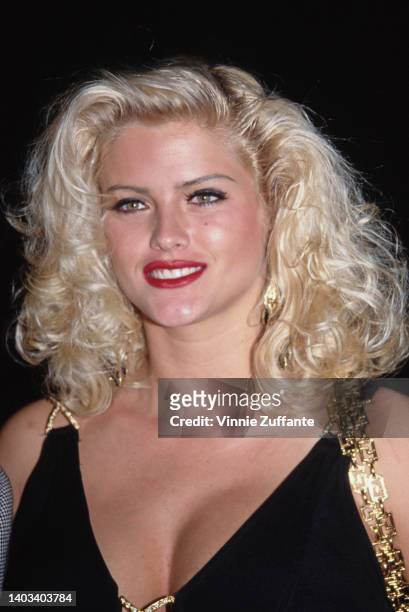 American glamour model and actress Anna Nicole Smith attends the opening night party for 'Guys and Dolls,' held at Club Tatou in Los Angeles,...