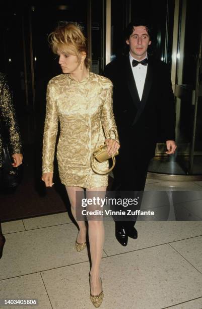 American actress Ellen Barkin and her husband, Irish actor Gabriel Byrne attend the New York Film Festival screening of 'Miller's Crossing', held at...