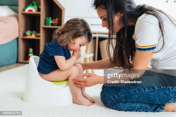 potty training - baby pee stock pictures, royalty-free photos & images