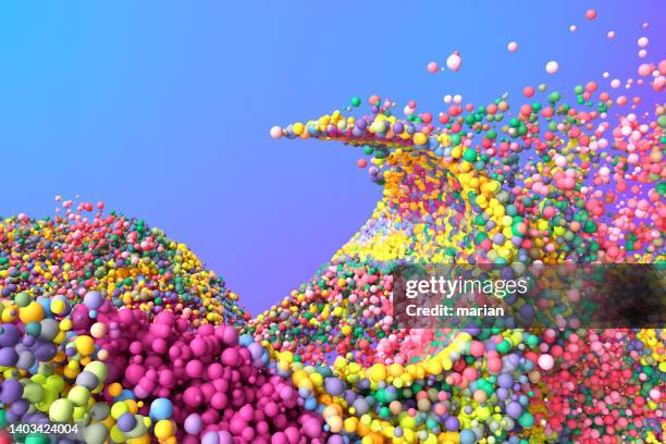 3d rendering, dynamic particles - multi coloured balls stock pictures, royalty-free photos & images