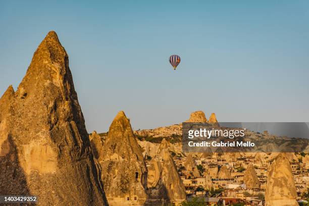 views of goreme and uchisar from far distance - cappadocia hot air balloon stock-fotos und bilder
