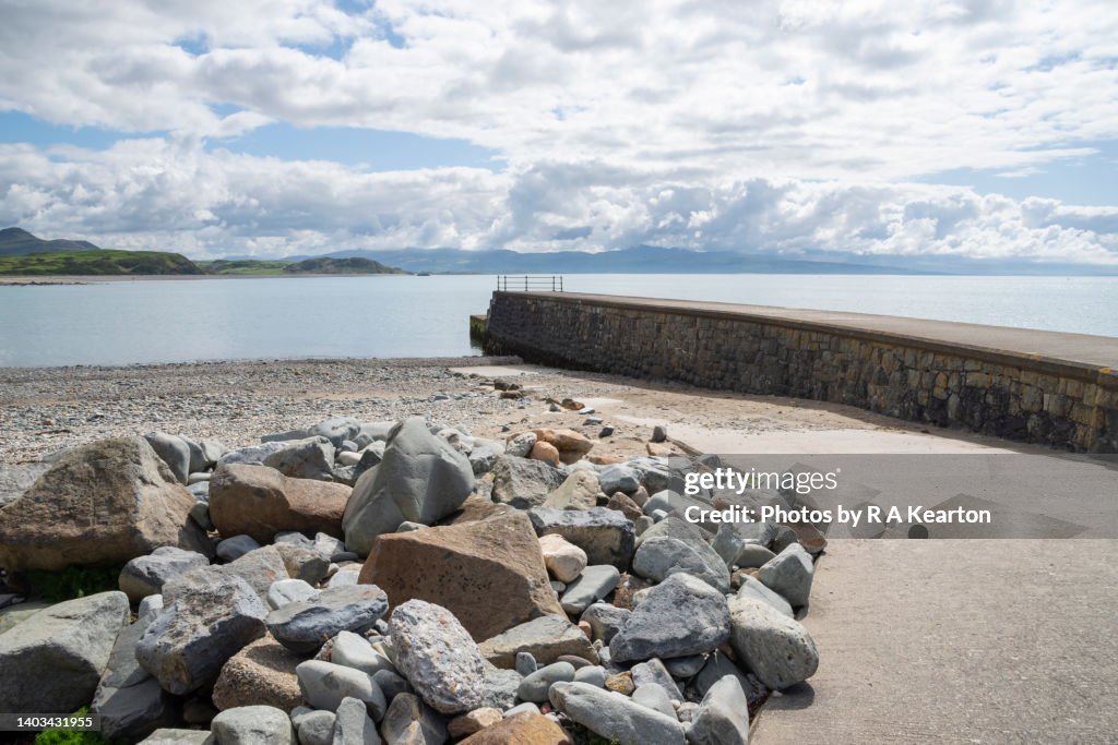 The breakwater on Criccieth beach, Tremadog Bay, North Wales