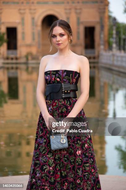 Stella del Carmen Banderas is seen at the front row ahead of "Crucero" collection fashion show organized by Dior at Plaza de España on June 16, 2022...