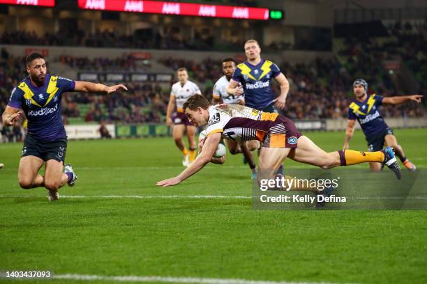 Corey Oates of the Broncos scores his 2nd try during the round 15 NRL match between the Melbourne Storm and the Brisbane Broncos at AAMI Park, on...