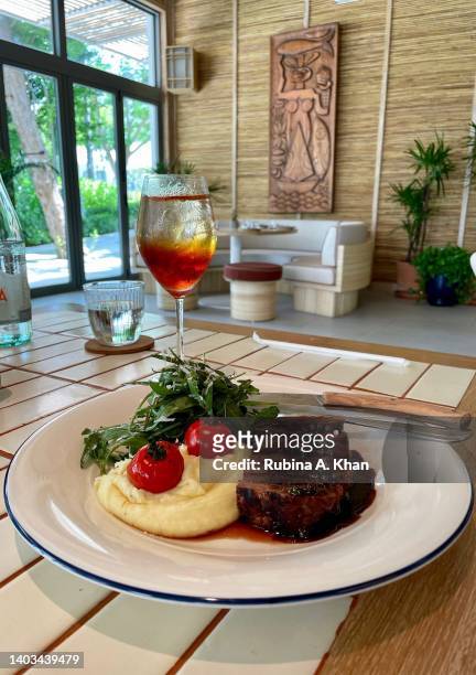 Tagliata Wagyu striploin with arugula, mashed potatoes and Chiang Mai tomatoes at Lido, the all-day Italian restaurant at The Standard Hua Hin hotel...