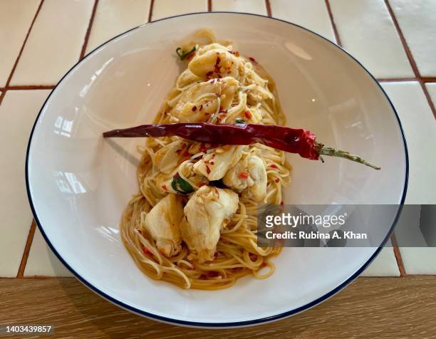 Crab & Chili angel hair pasta, parmesan, extra-virgin olive oil and chili at Lido, the all-day Italian restaurant at The Standard Hua Hin hotel that...