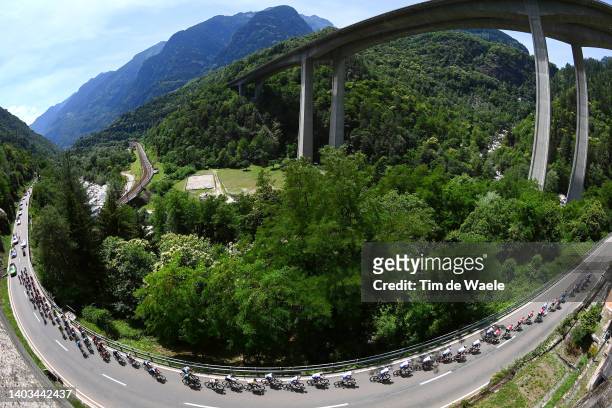 General view of the peloton passing down a bridge at Lavorgo during the 85th Tour de Suisse 2022 - Stage 6 a 177,5km stage from Locarno to Moosalp...