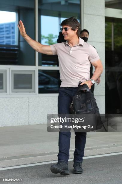 Actor Tom Cruise waves to his fans upon his arrival at Gimpo International Airport on June 17, 2022 in Seoul, South Korea. Tom Cruise is visiting...