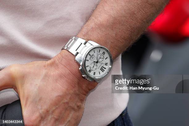 Actor Tom Cruise, watch detail, waves to his fans upon his arrival at Gimpo International Airport on June 17, 2022 in Seoul, South Korea. Tom Cruise...
