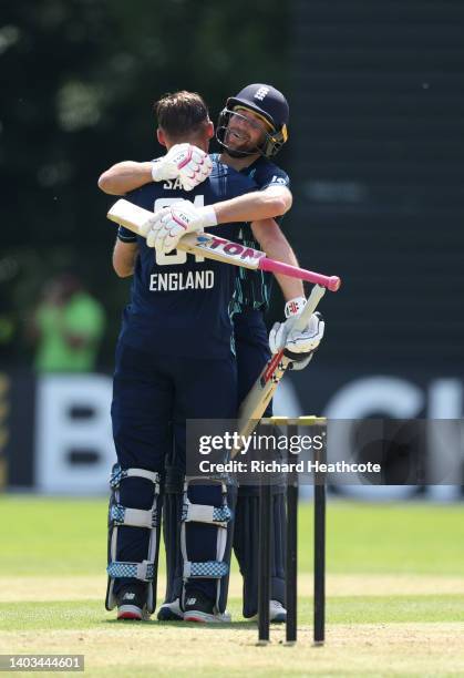 Dawid Malan congratulates Phil Salt of England as he reaches his century during the 1st One Day International between Netherlands and England at VRA...