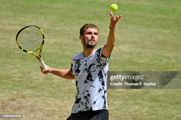 Oscar Otte of Germany serves in his match against Karen Khachanov of Russia during day seven of the 29th Terra Wortmann Open at OWL-Arena on June 17,...