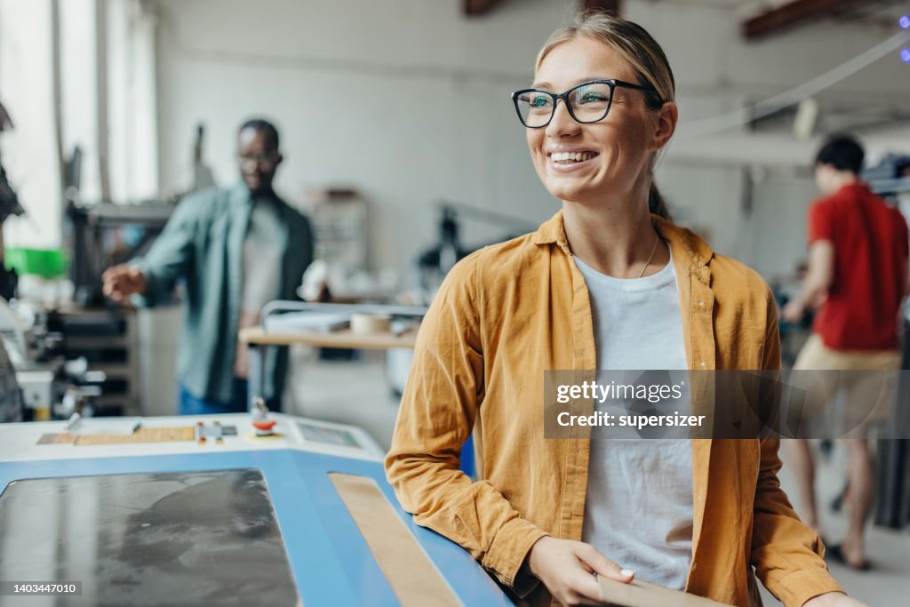 Portrait in front of machine