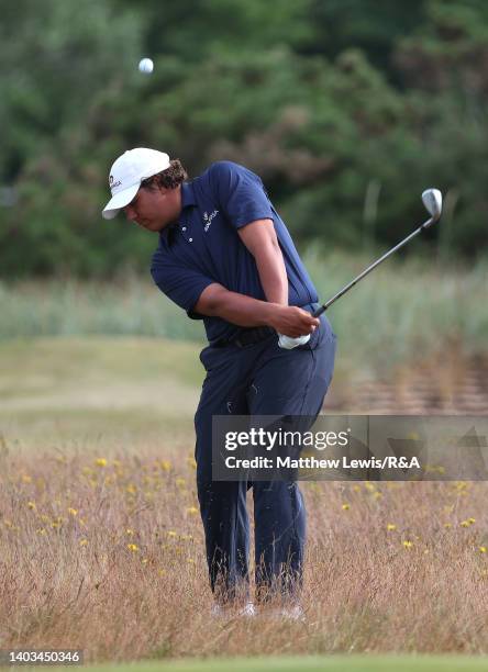 Aldrich Potgieter of South Africa chips onto the 1st green during the Quarter Finals on day five of the R&A Amateur Championship at Royal Lytham &...