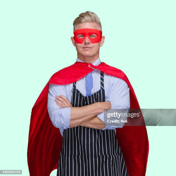 caucasian male hero standing in front of black background wearing costume - cape verde imagens e fotografias de stock