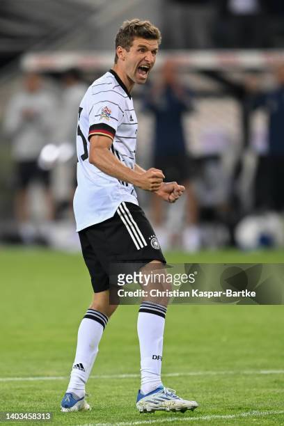 Thomas Mueller of Germany celebrates after scoring his team`s third goal during the UEFA Nations League League A Group 3 match between Germany and...