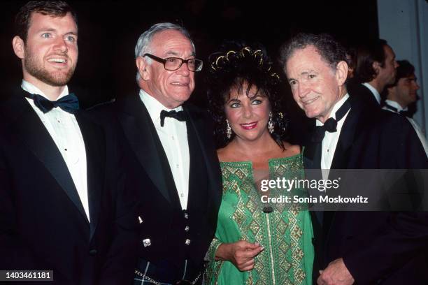 View of businessman and Forbes magazine publisher Malcolm Forbes and actor Elizabeth Taylor , with unidentified others as they attend Forbes' 70th...