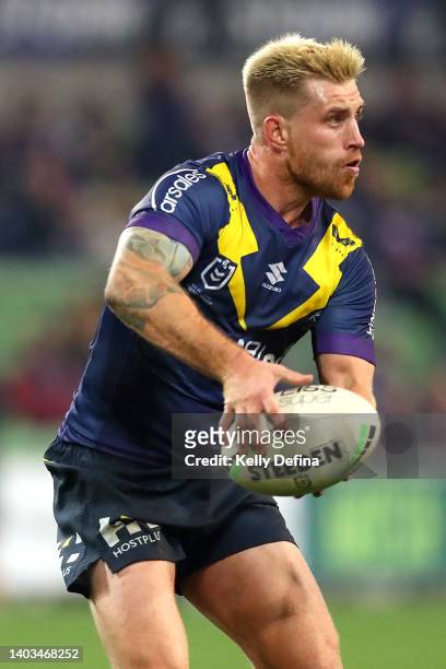Cameron Munster of the Storm passes during the round 15 NRL match between the Melbourne Storm and the Brisbane Broncos at AAMI Park, on June 17 in...