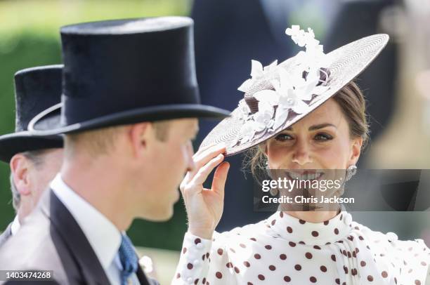 Catherine, Duchess of Cambridge smiles at Prince William, Duke of Cambridge as they arrive into the parade ring during Royal Ascot 2022 at Ascot...