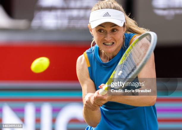 Aliaksandra Sasnovich of Belarus hits a backhand during the quarter final match between Ons Jabeur of Tunisia and Aliaksandra Sasnovich of Belarus on...