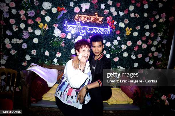 Fabienne Thibeault and Jeremy Bellet pose during the presentation of "la Fourchette d'or" at the Escale Bollywood restaurant on June 16, 2022 in...