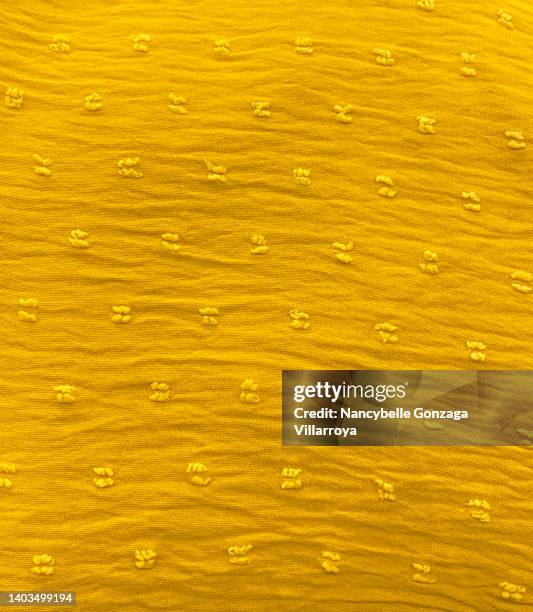 yellow coloured embroidered cotton sheer fabric - crepe stock pictures, royalty-free photos & images