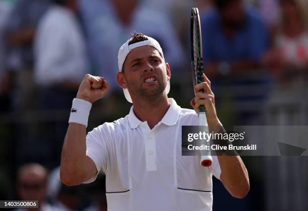 Filip Krajinovic of Serbia celebrates winning against Ryan Peniston of Great Britain during the Men's Singles Quarter Final match on day five of the...