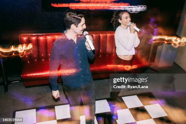 friends night out at karaoke dance bar - ryan singer stockfoto's en -beelden