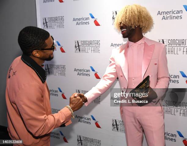 Usher and honoree Lil Nas X appear backstage at the Songwriters Hall of Fame 51st Annual Induction and Awards Gala at Marriott Marquis on June 16,...