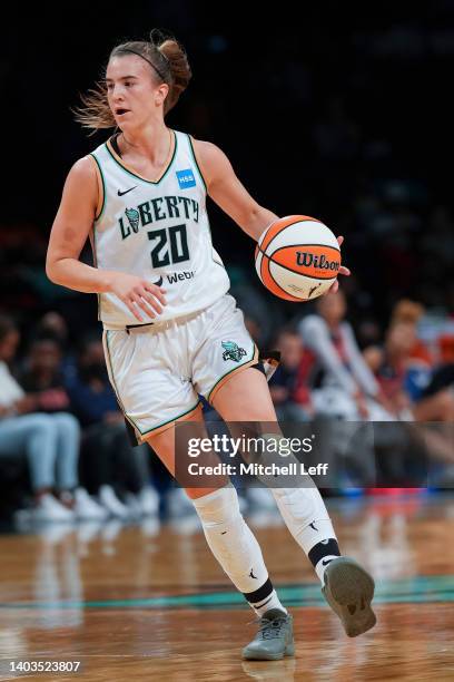 Sabrina Ionescu of the New York Liberty dribbles the ball against the Washington Mystics at the Barclays Center on June 16, 2022 in the Brooklyn...