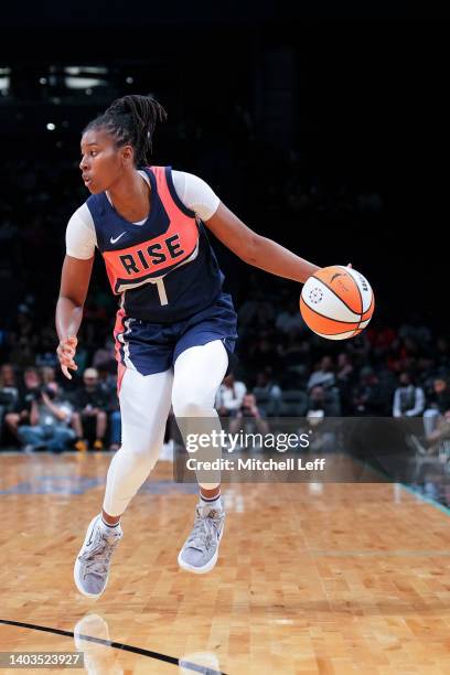 Ariel Atkins of the Washington Mystics dribbles the ball against the New York Liberty at the Barclays Center on June 16, 2022 in the Brooklyn borough...