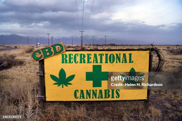 Sign for the sale of cannabis on April 20, 2022 in Moffat, Colorado. The small town, in the San Luis Valley near Sand Dunes, has benefited from the...