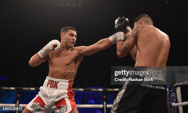 Josh Kelly punches Peter Kramer during the Super Welterweight fight between Josh Kelly and Peter Kramer as part of the Wasserman fight night at M&S...