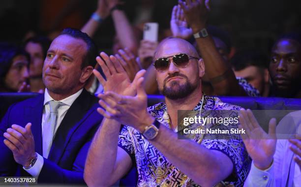 Boxing promoter Kalle Sauerland watches on with Tyson Fury during the Vacant IBF International Heavyweight Championship fight between Nathan Gorman...