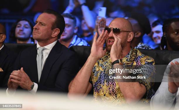 Boxing promoter Kalle Sauerland watches on with Tyson Fury during the Vacant IBF International Heavyweight Championship fight between Nathan Gorman...