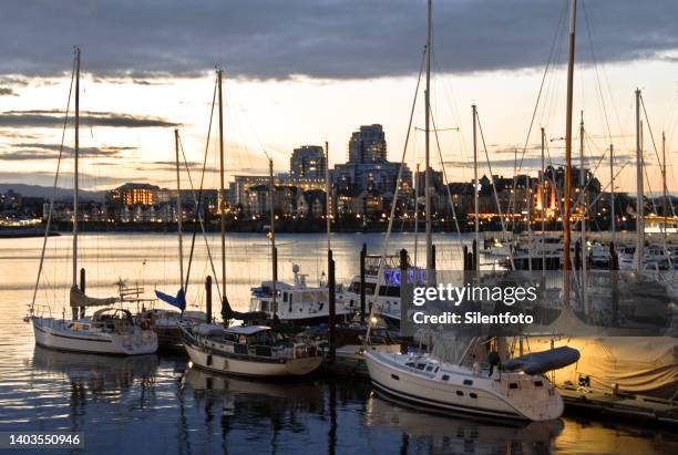 sunset and cloud victoria inner harbour - victoria harbour vancouver island stock pictures, royalty-free photos & images