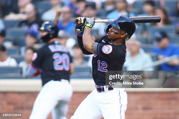 Francisco Lindor of the New York Mets hits a 3-run home run in the first inning against the Miami Marlins at Citi Field on June 17, 2022 in New York...