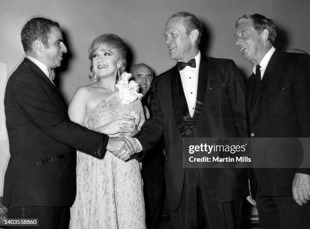 American comedienne, actress, singer and businesswoman Edie Adams , House Minority Leader and future president of the United States, Gerald Ford and...