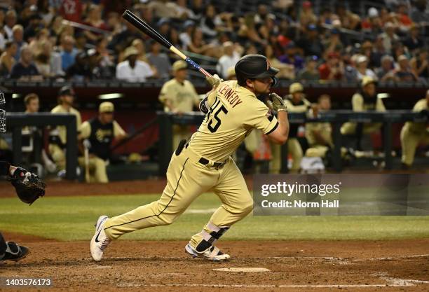 Buddy Kennedy of the Arizona Diamondbacks gets his first MLB hit as he singles against the Minnesota Twins during the fifth inning at Chase Field on...