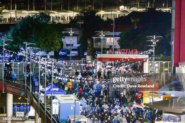 Crowds arriving early in the rainfor the 2022 Super Rugby Pacific Final match between the Blues and the Crusaders at Eden Park on June 18, 2022 in...