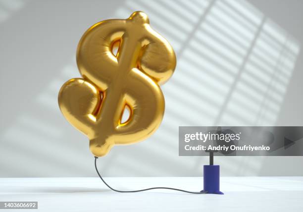 pumped air balloon dollar sign - luftpumpe stock-fotos und bilder
