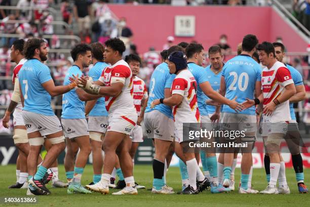 Japan and Uruguay players shake hands after the rugby international test match between Japan and Uruguay at Prince Chichibu Memorial Rugby Ground on...