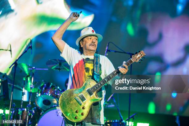 Guitarist Carlos Santana of Santana performs on stage at North Island Credit Union Amphitheatre on June 17, 2022 in Chula Vista, California.