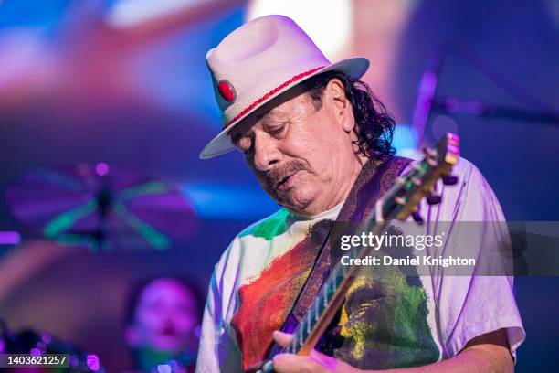 Guitarist Carlos Santana of Santana performs on stage at North Island Credit Union Amphitheatre on June 17, 2022 in Chula Vista, California.